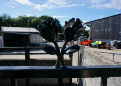 Floral design welded into our new metal railings